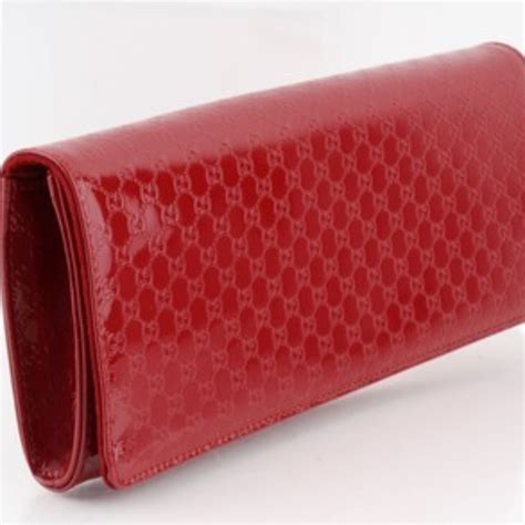 gucci red patent clutch|Gucci guccissima clutch.